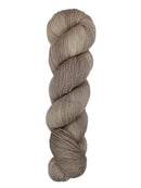 A skein of hand-dyed fingering/sock yarn color off-white and grey 