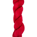 A skein of hand-dyed fingering/sock yarn color red