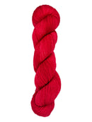 A skein of hand-dyed fingering/sock yarn color red