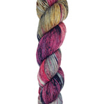 A skein of hand-dyed fingering/sock yarn color grey golden yellow red purple black speckles