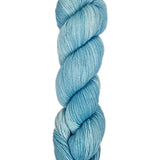 A skein of hand-dyed fingering/sock yarn color light grey white blue 