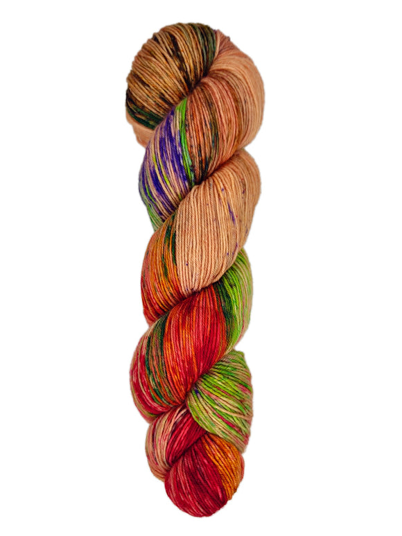 A skein of hand-dyed fingering/sock yarn color orange red  green brown purple black speckles