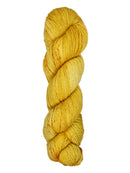 A skein of hand-dyed fingering/sock yarn color golden yellow orange speckles