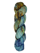 A skein of hand-dyed fingering/sock yarn color blue brown orange speckles