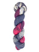 A skein of hand-dyed fingering/sock yarn color red black grey white speckles