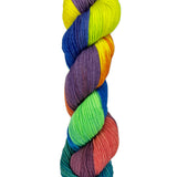A skein of hand-dyed fingering/sock yarn color yellow purple blue green  pink