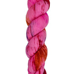 A skein of hand-dyed fingering/sock yarn color pink red orange navy speckles