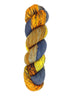 A skein of hand-dyed fingering/sock yarn color orange grey navy yellow black speckles
