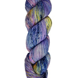 A skein of hand-dyed fingering/sock yarn color purple yellow pink navy black speckles
