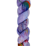 A skein of hand-dyed fingering/sock yarn color purple red green blue red orange speckles