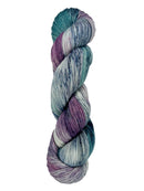 A skein of hand-dyed fingering/sock yarn color teal purple grey navy speckles