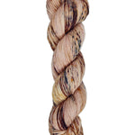 A skein of hand-dyed fingering/sock yarn color pink brown burgundy speckles