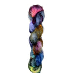 Skein of superkid mohair silk lace weight yarn color black red green yellow