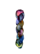 Skein of superkid mohair silk lace weight yarn color black red green yellow