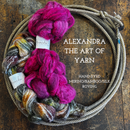 Braids of hand dyed wool bamboo silk roving on a wooden surface