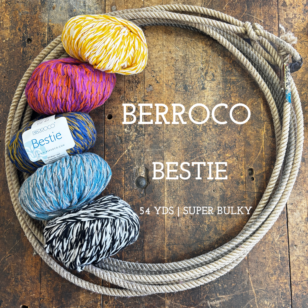 Balls of colorful yarn on a wooden surface