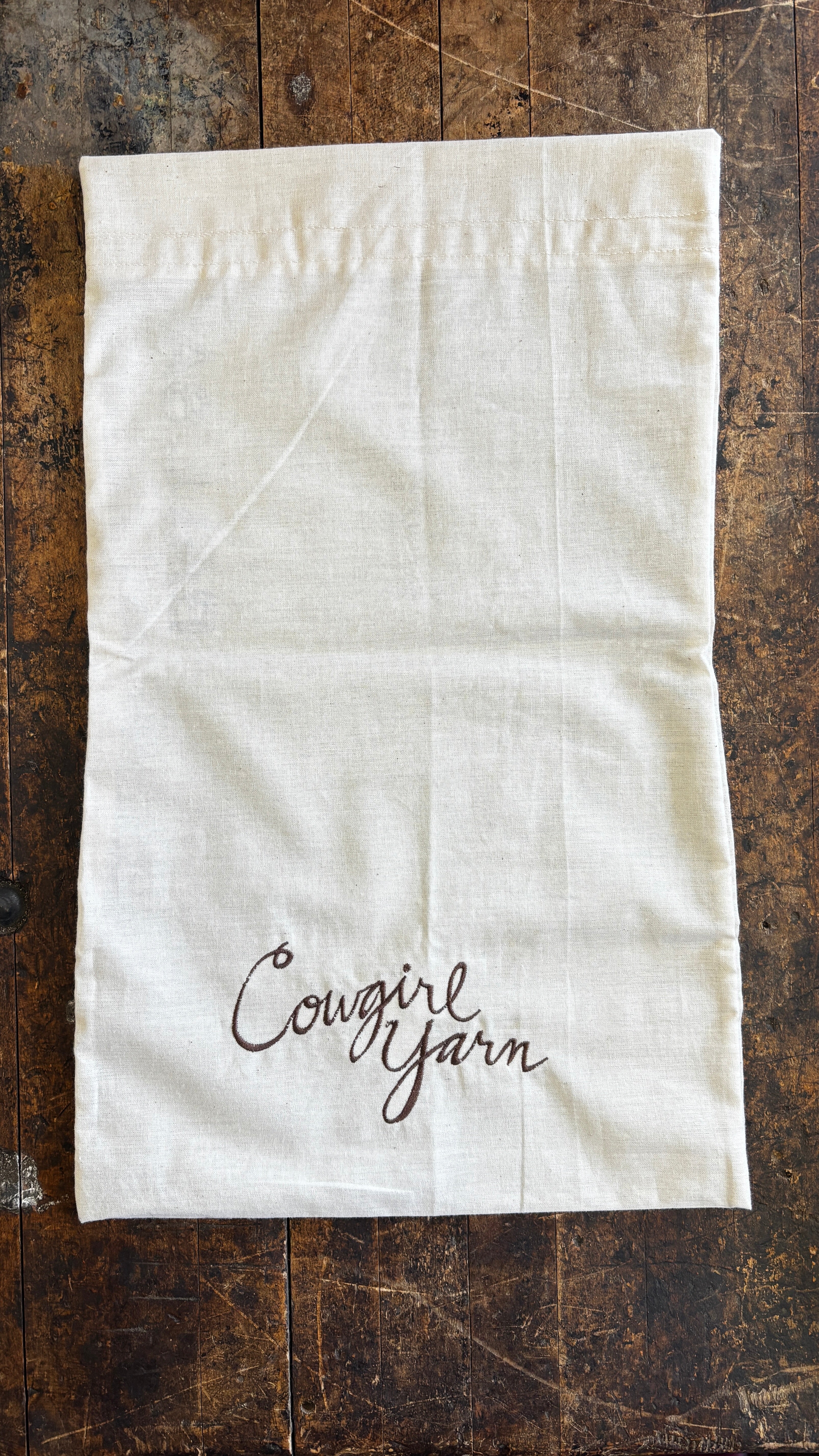 Cloth project bag with Cowgirl Yarn hand embroidered