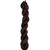 Brown skein of wool yarn on a white background
