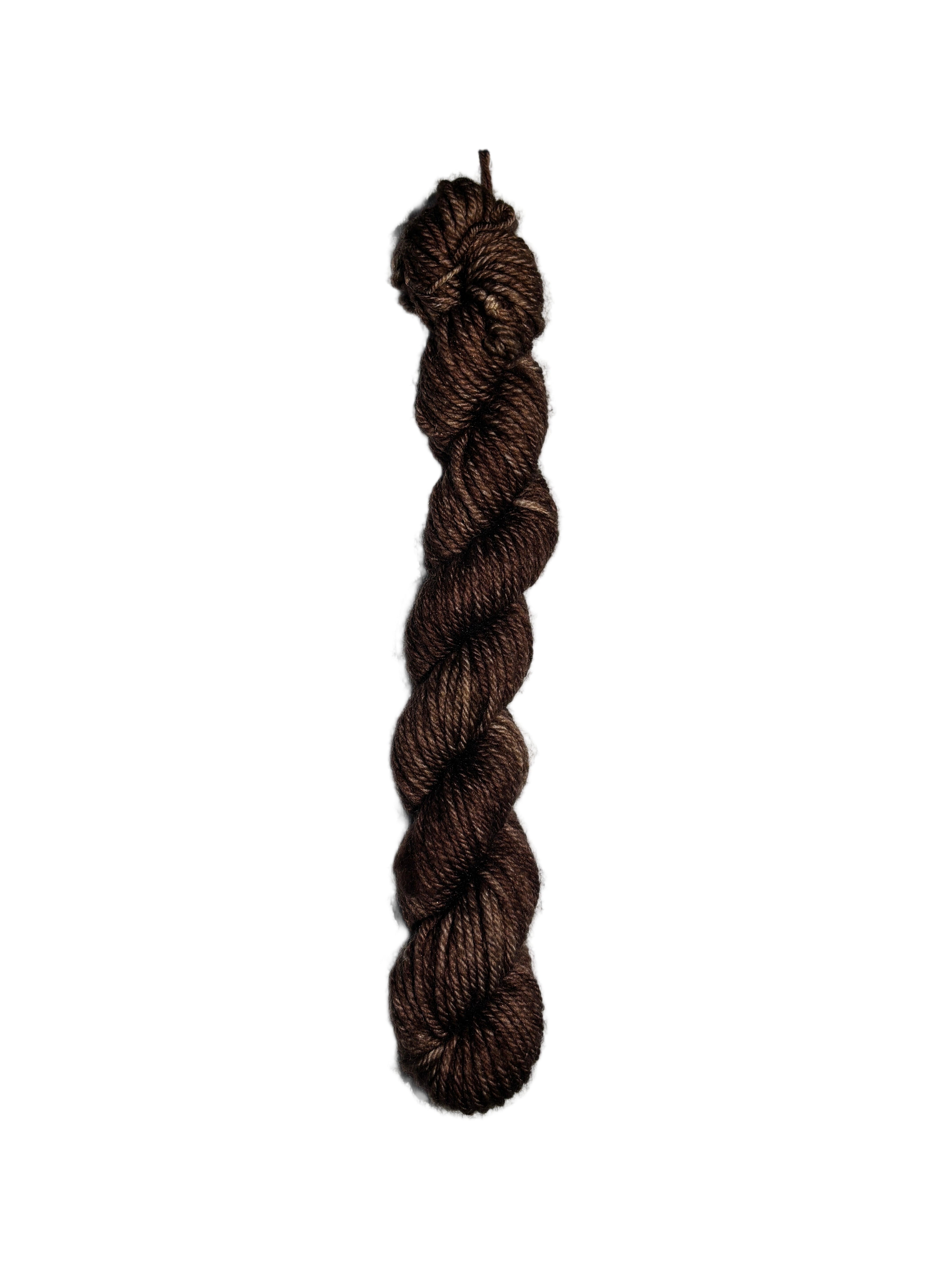 Brown skein of wool yarn on a white background