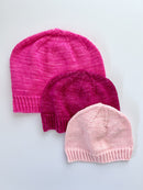 3 Base Doodle Beanies in various sizes knit in the colors pink magenta and light pink