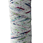 Red, blue, and green speckled skein of yarn 