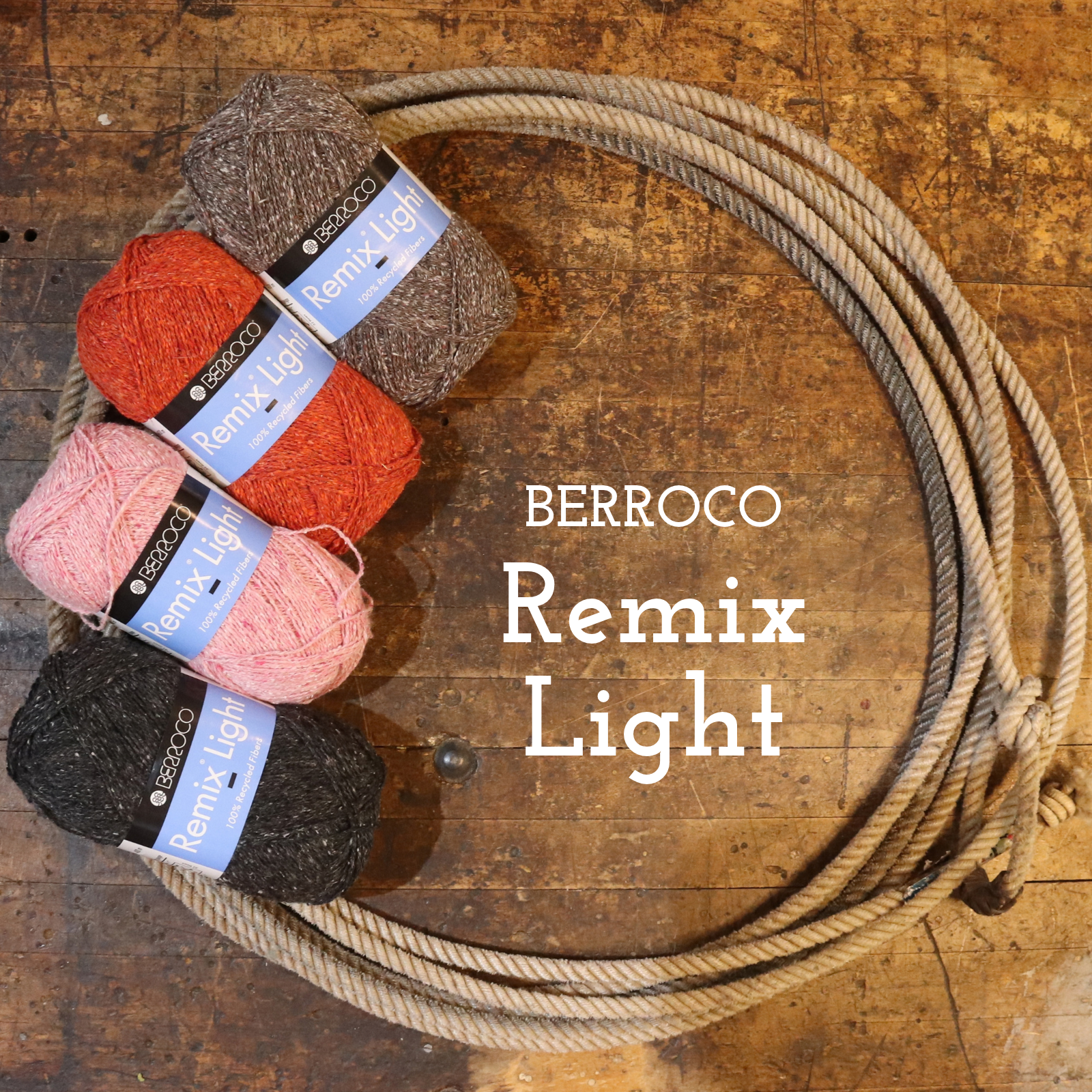 Four skeins of Berroco Remix Light yarn in black, pink, rust orange, and taupe, arranged next to a large coiled jute rope on a rustic wooden background with white text reading 'BERROCO Remix Light'.