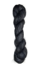 Skein of mohair silk yarn hand-dyed in Wyoming in the color black