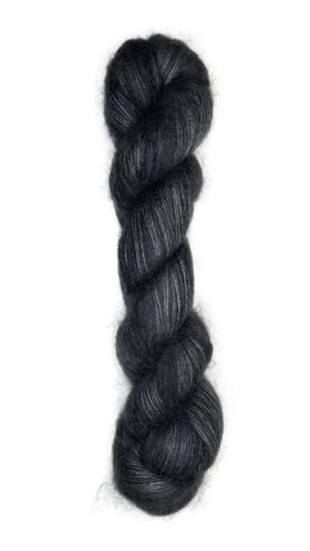 Skein of mohair silk yarn hand-dyed in Wyoming in the color black