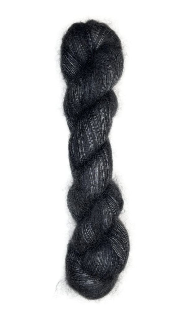 Skein of mohair silk yarn hand-dyed in Wyoming in the color black
