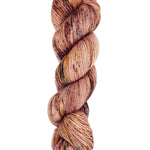 A skein of hand-dyed fingering/sock yarn color pink black yellow purple speckles