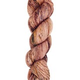 A skein of hand-dyed fingering/sock yarn color pink black yellow purple speckles