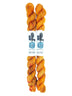 Blackbird Sycamore Fingering Mini Skein color orange with dark brown flecks