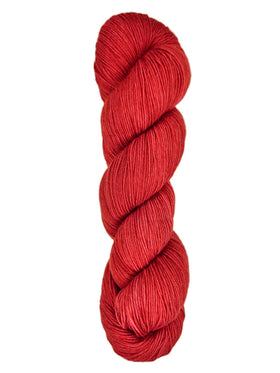 A skein of hand-dyed fingering/sock yarn color red
