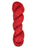 A skein of hand-dyed fingering/sock yarn color red