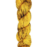 A skein of hand-dyed fingering/sock yarn color yellow brown speckles