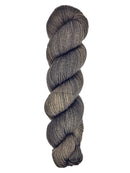A skein of hand-dyed fingering/sock yarn color dark gray brown