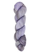 A skein of hand-dyed fingering/sock yarn color gray sky blue