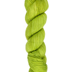 A skein of hand-dyed fingering/sock yarn color bright green