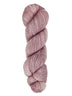 A skein of hand-dyed fingering/sock yarn color dusty pink