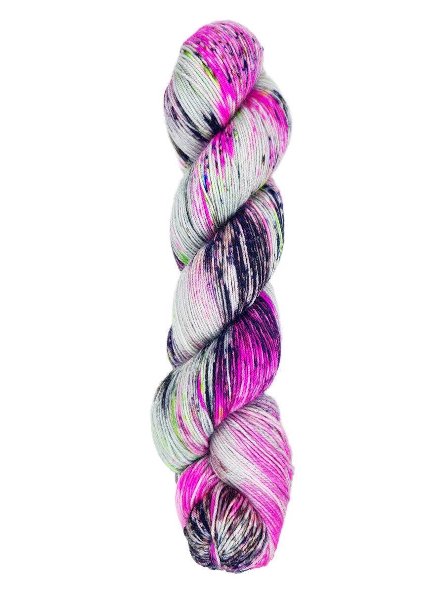 A skein of hand-dyed fingering/sock yarn color pink gray and green black speckles