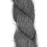 A skein of handspun angora and merino yarn in  natural grey color