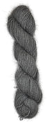 A skein of handspun angora and merino yarn in  natural grey color