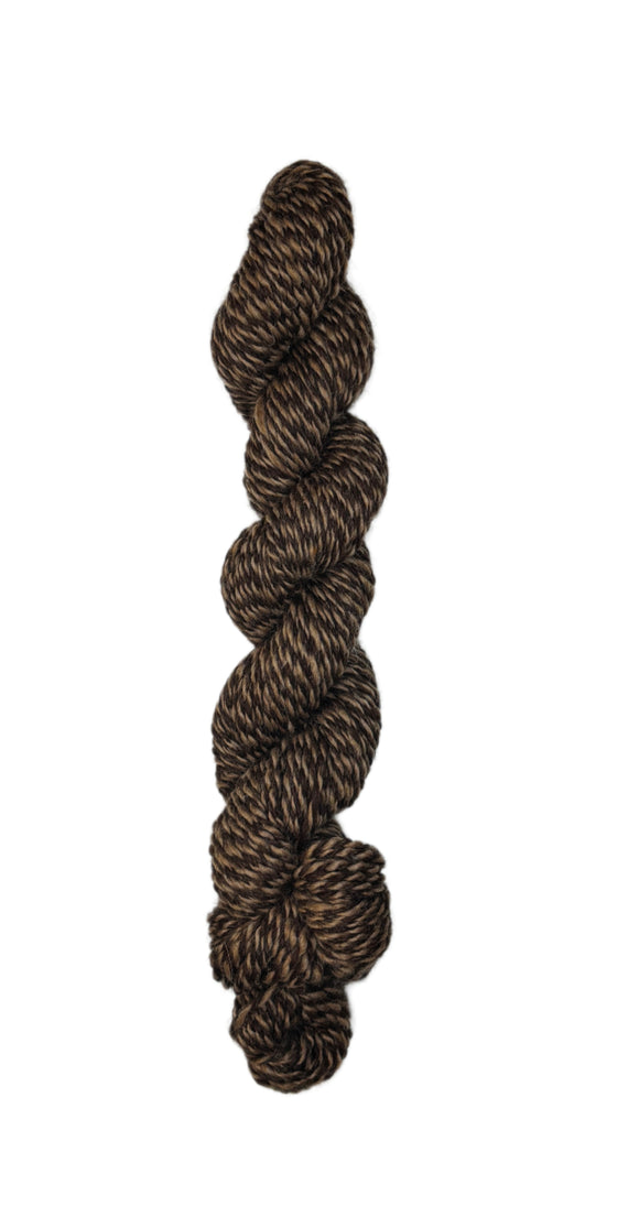 Skein of exclusive Cowgirl wool Yarn in the color Brown and Black Marl