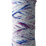 Purple, pink, blue skein of yarn 