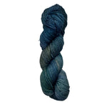 Blue skein of yarn on a white background