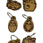 Wooden stitch markers with chickens etched in