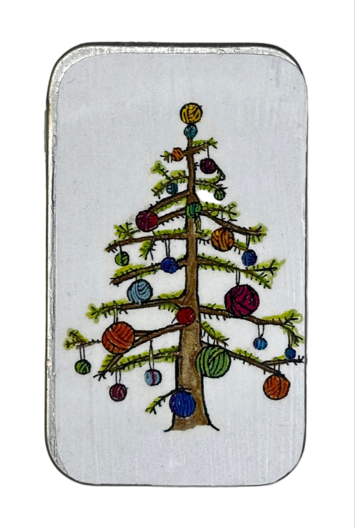 Small rectangular tin with a cartoon design of a Christmas Tree on a white background