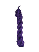 Purple skein of wool yarn on a white background
