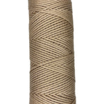 Skein of cotton yarn in the color tan
