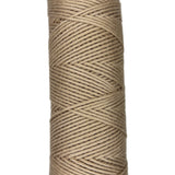 Skein of cotton yarn in the color tan
